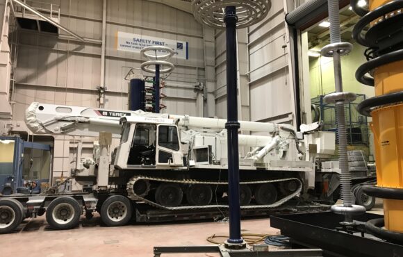 A bucket truck on its transporter awaiting testing