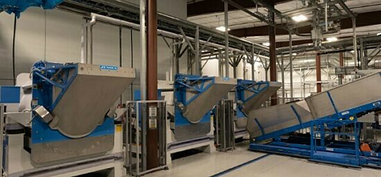 Photograph of Kinectrics' laundry facility conveyor belts and chutes