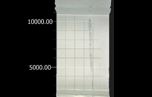 Photograph of a material surface layered onto a chart
