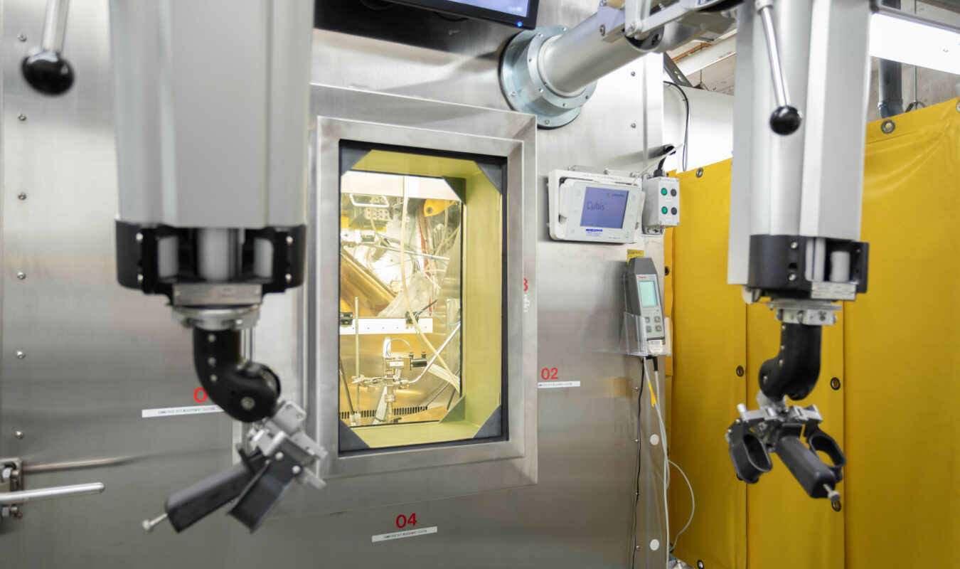 Remote manipulators in front of a "warm cell"