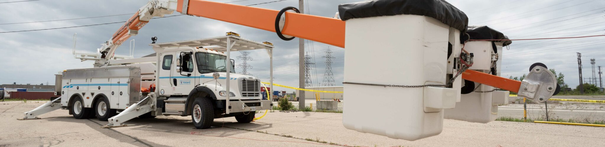 Bucket truck deployed next to a power line