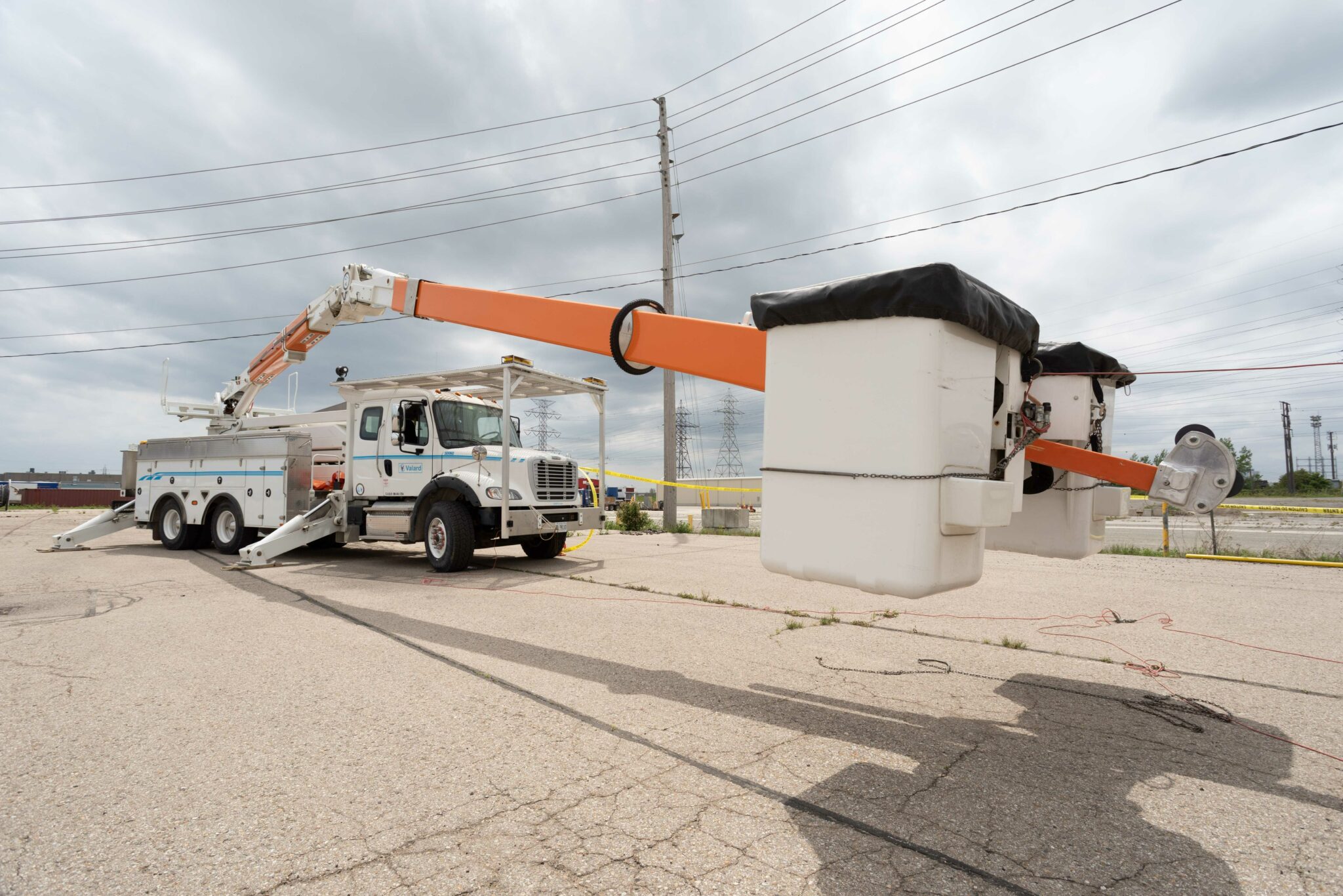 Bucket truck deployed next to a power line