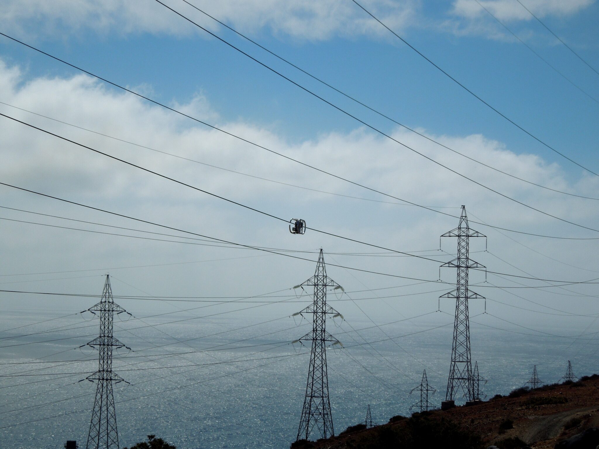 The Kinectrics LineVue tool inspecting a live powerline