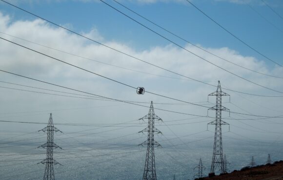 The Kinectrics LineVue tool inspecting a live powerline