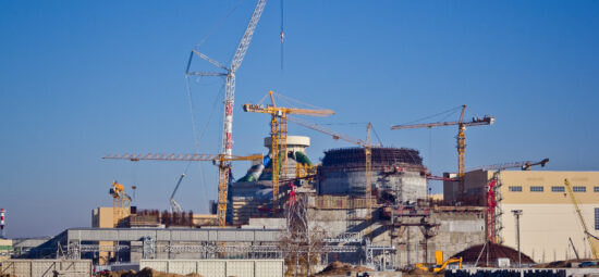 Cranes constructing a brand new nuclear facility